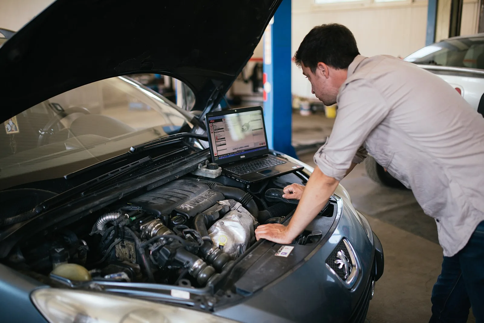 Laptop connected for engine diagnostics